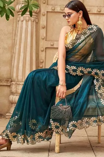 Teal net embroidered saree with blouse