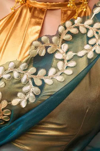 Teal net embroidered saree with blouse