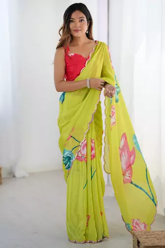 lemon yellow heavy chiffon mirror work saree