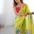 lemon yellow heavy chiffon mirror work saree