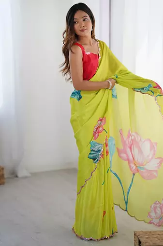 lemon yellow heavy chiffon mirror work saree