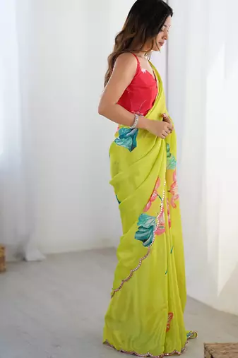 lemon yellow heavy chiffon mirror work saree