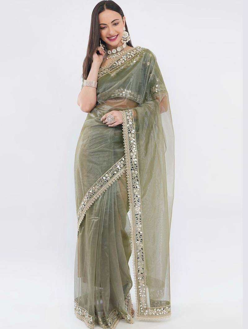 Olive net embellished saree with blouse