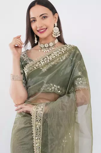 Olive net embellished saree with blouse