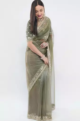Olive net embellished saree with blouse