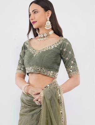 Olive net embellished saree with blouse 4