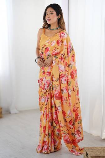 peach heavy chiffon mirror work saree