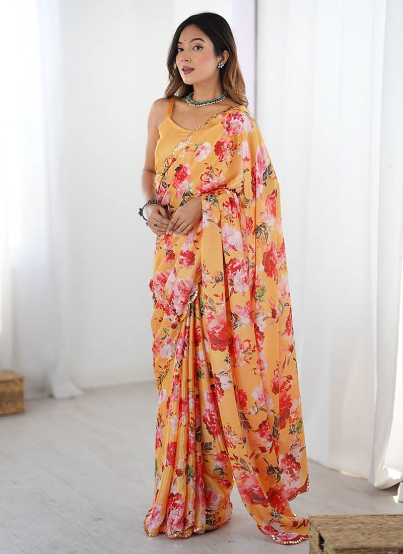 peach heavy chiffon mirror work saree