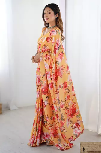 peach heavy chiffon mirror work saree