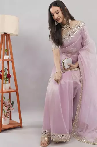 Pink net embellished saree with blouse
