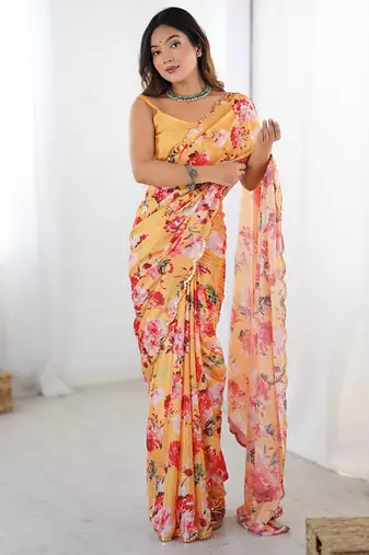 peach heavy chiffon mirror work saree