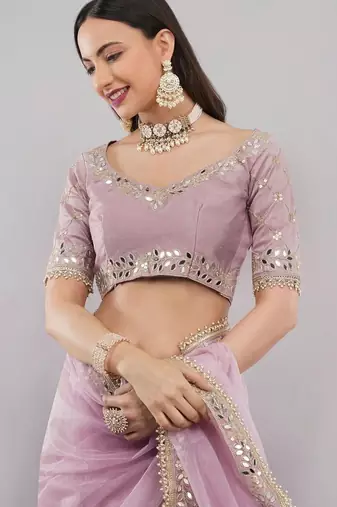 Pink net embellished saree with blouse
