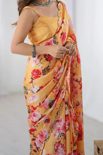 peach heavy chiffon mirror work saree