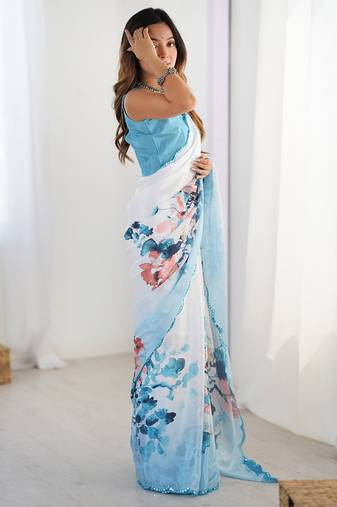 sky blue heavy chiffon mirror work saree