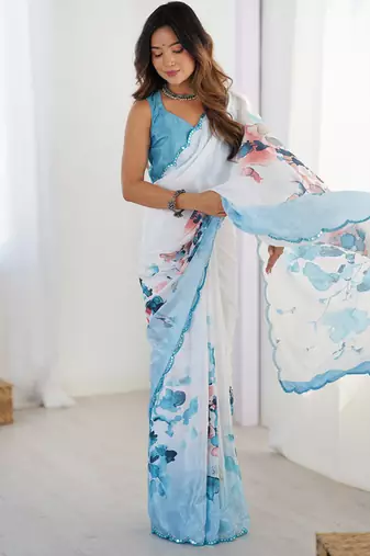 sky blue heavy chiffon mirror work saree