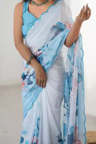 sky blue heavy chiffon mirror work saree