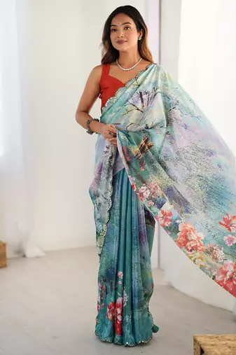 turquoise heavy chiffon mirror work saree