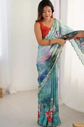 turquoise heavy chiffon mirror work saree