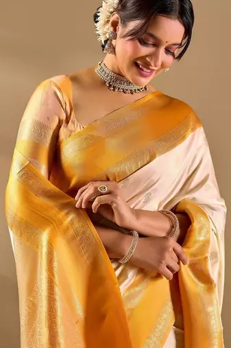 Off white silk blend woven design saree with blouse