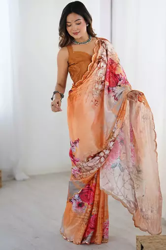 peach heavy chiffon mirror work saree