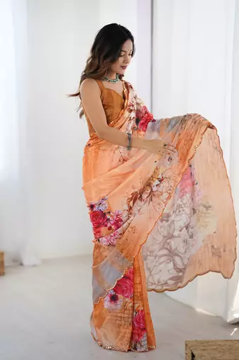 peach heavy chiffon mirror work saree