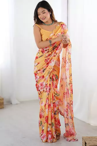 peach heavy chiffon mirror work saree