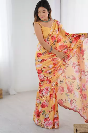 peach heavy chiffon mirror work saree