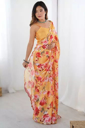 peach heavy chiffon mirror work saree