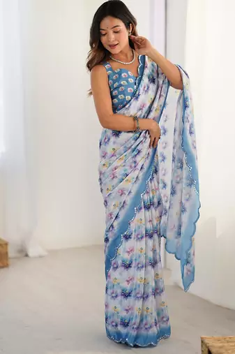 sky blue heavy chiffon mirror work saree