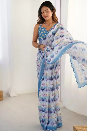 sky blue heavy chiffon mirror work saree
