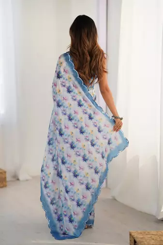sky blue heavy chiffon mirror work saree