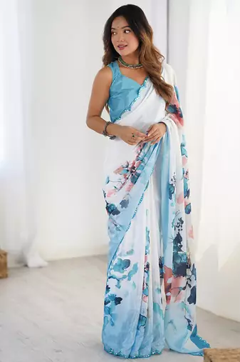 sky blue heavy chiffon mirror work saree