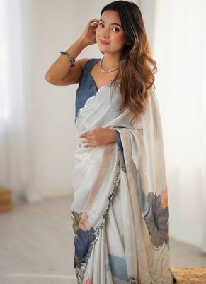 off white heavy chiffon mirror work saree 5