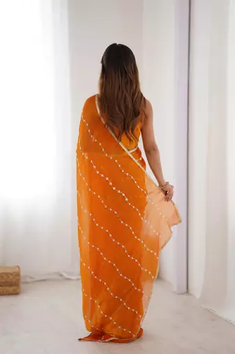 orange heavy smooth sitara mirror work satin saree