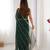 dark green heavy smooth sitara mirror work satin saree