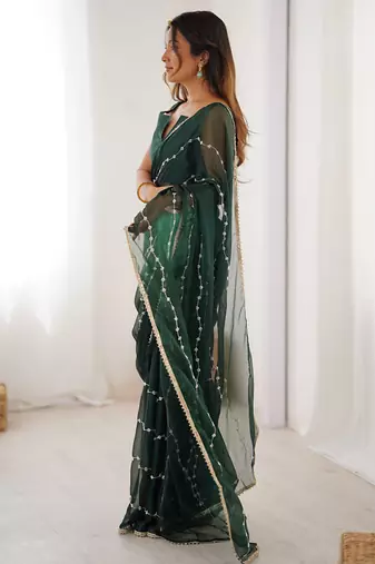 dark green heavy smooth sitara mirror work satin saree