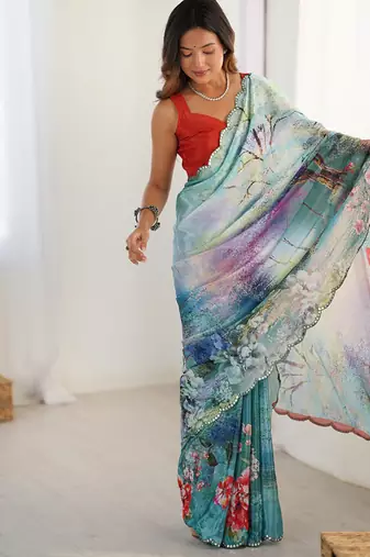 aqua blue heavy chiffon mirror work saree