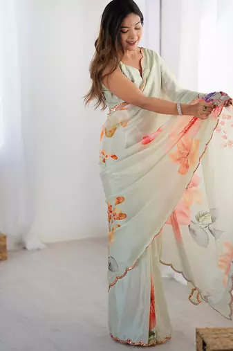 pastel heavy chiffon mirror work saree