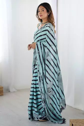 aqua blue heavy chiffon mirror work saree