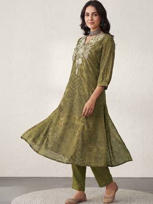 Women Ethnic Motifs Printed Regular Thread Work Kurta with Trousers 5