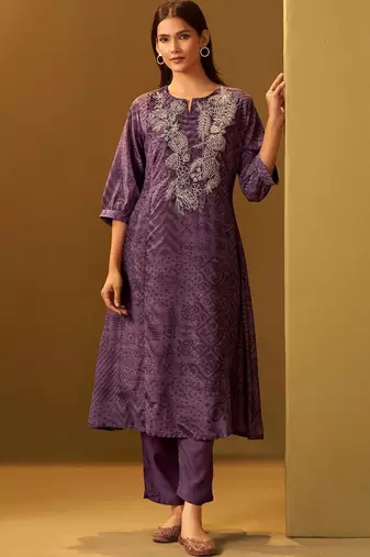 Women Ethnic Motifs Printed Regular Thread Work Kurta with Trousers