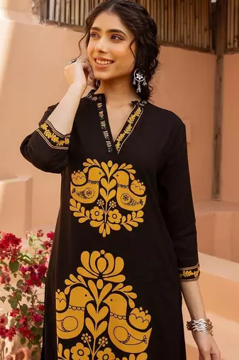 Women Ethnic Motifs Printed Regular Beads and Stones Kurta with Palazzos