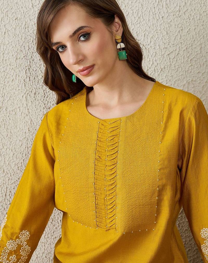 Women Mustard Ethnic Motifs Embroidered Regular Straight Kurta Sets