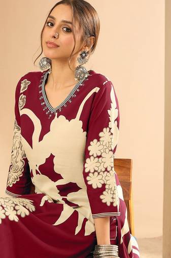Women Floral Printed Regular Sequinned Kurta with Salwar