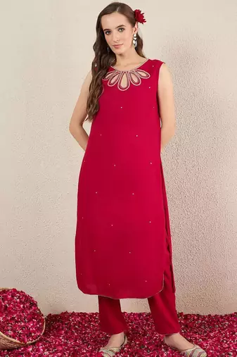 Women Solid Embroidered Kurta with Trousers