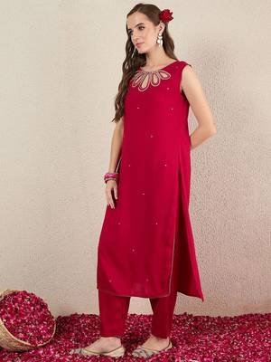 Women Solid Embroidered Kurta with Trousers 4