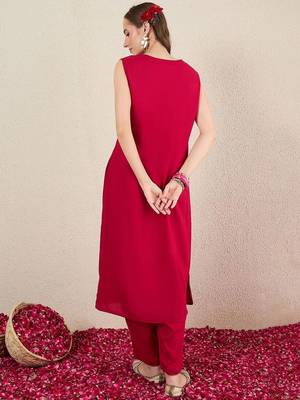 Women Solid Embroidered Kurta with Trousers 5