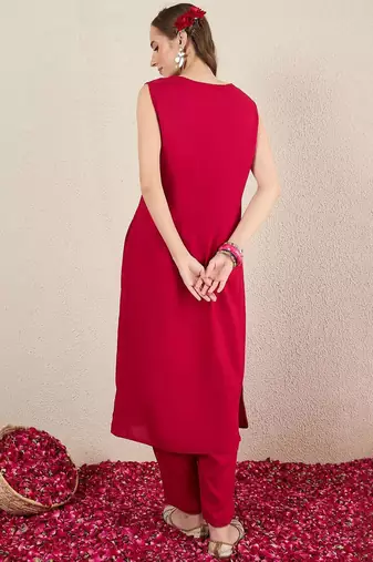 Women Solid Embroidered Kurta with Trousers