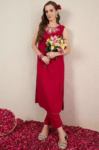 Women Solid Embroidered Kurta with Trousers