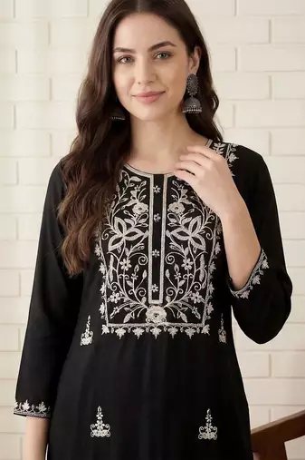 Women Ethnic Motifs Embroidered Regular Thread Work Kurta with Trousers
